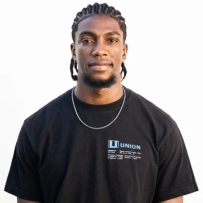 Emmanuel Anderson, photographed against a white background
