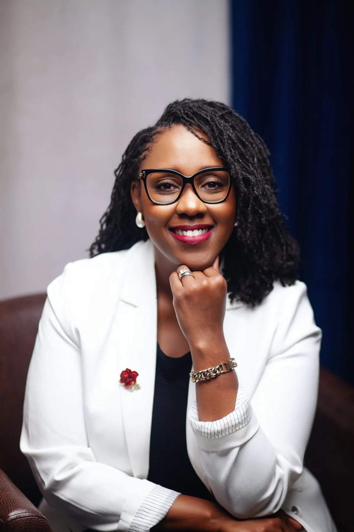 Candice Simmons, President and CEO of Enterprising Black Orlando, in a white blazer