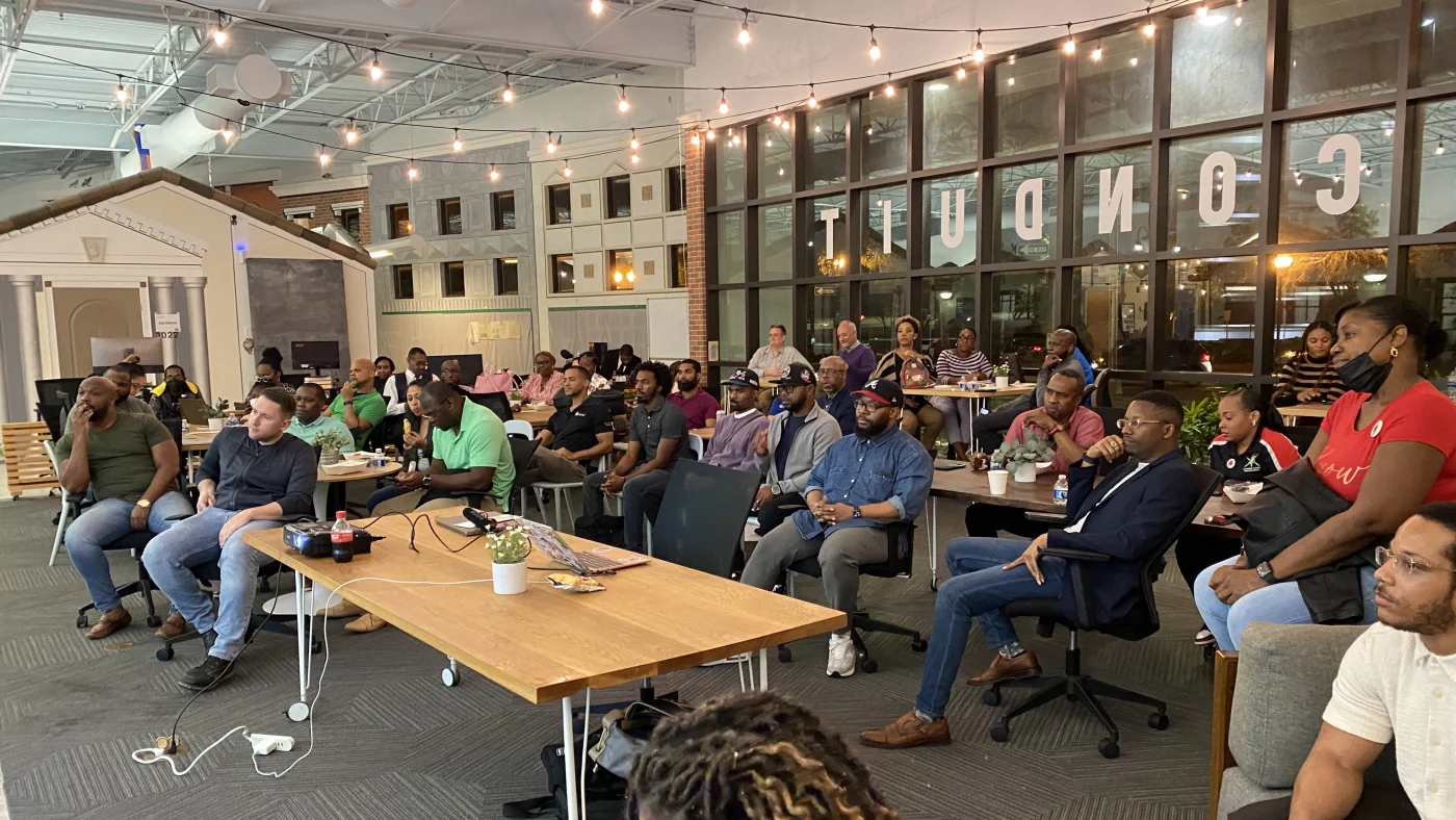 A full room of attendees seated for a Building Our Tech community event at Credo Conduit