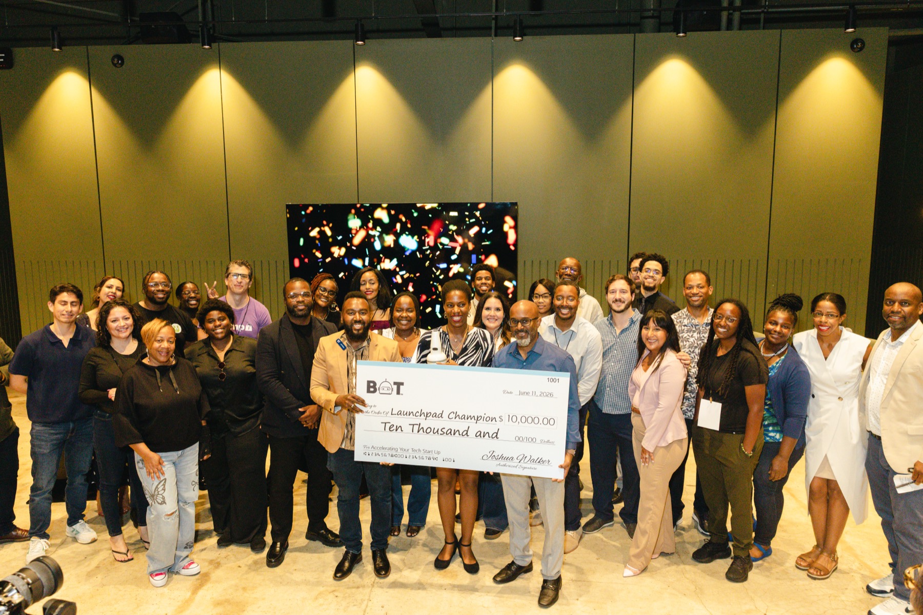 Founders and the Building Our Tech community celebrating a pitch competition win