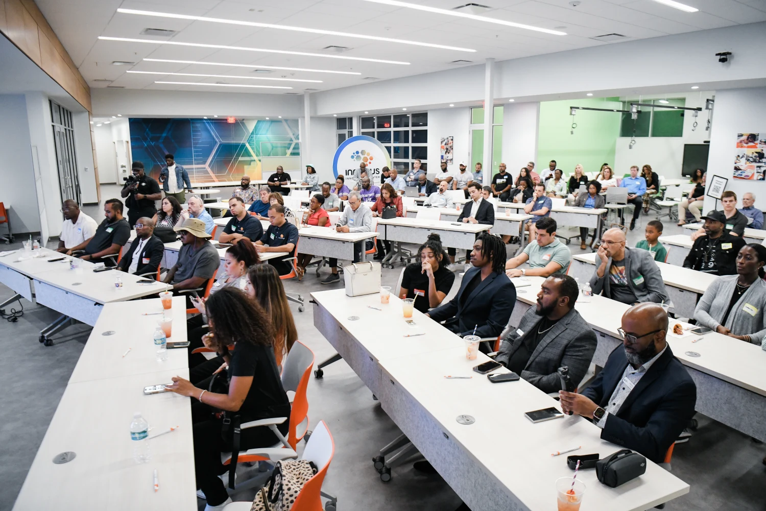 A full room of attendees seated at the 2024 pitch competition