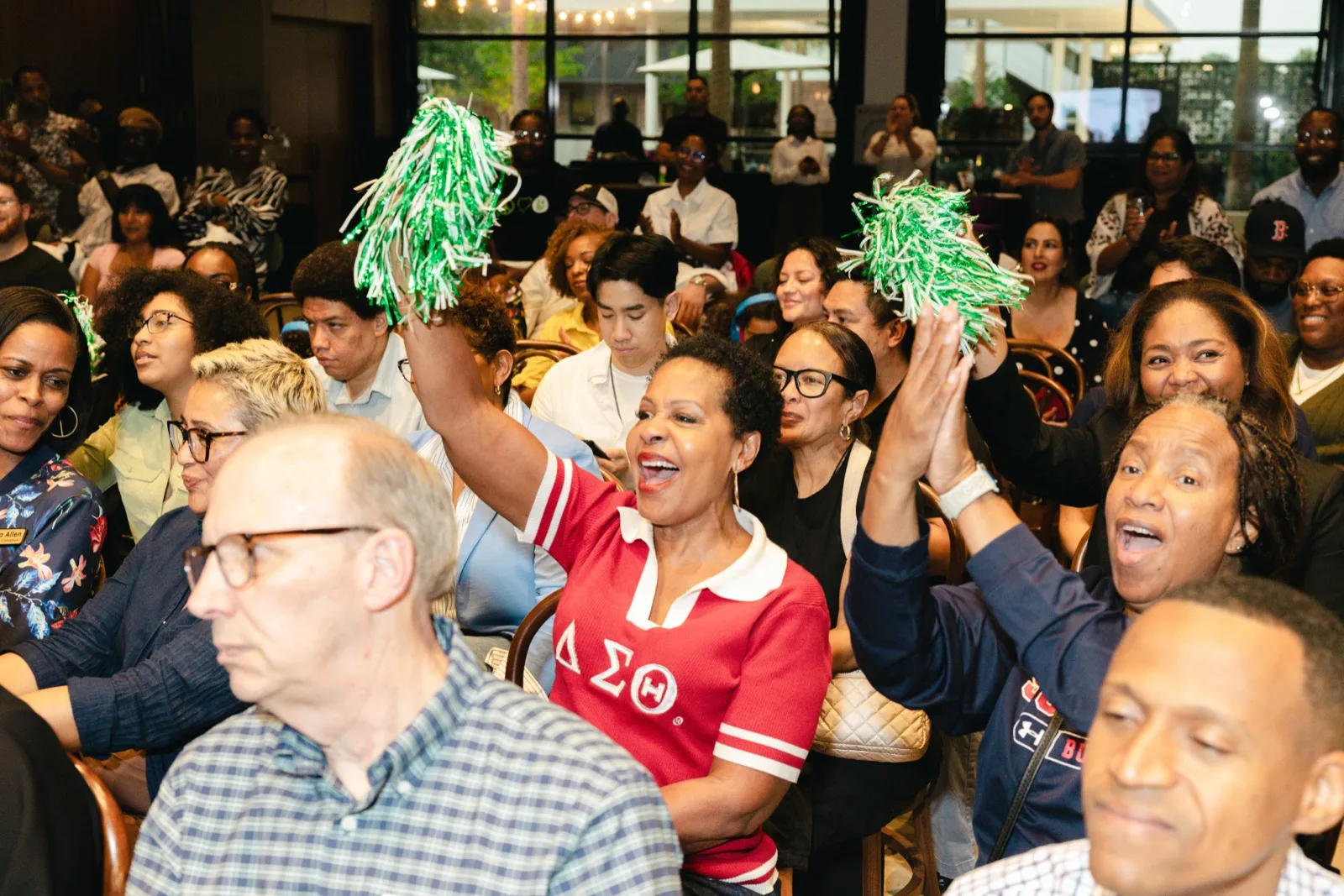 The audience on its feet during a Building Our Tech pitch competition