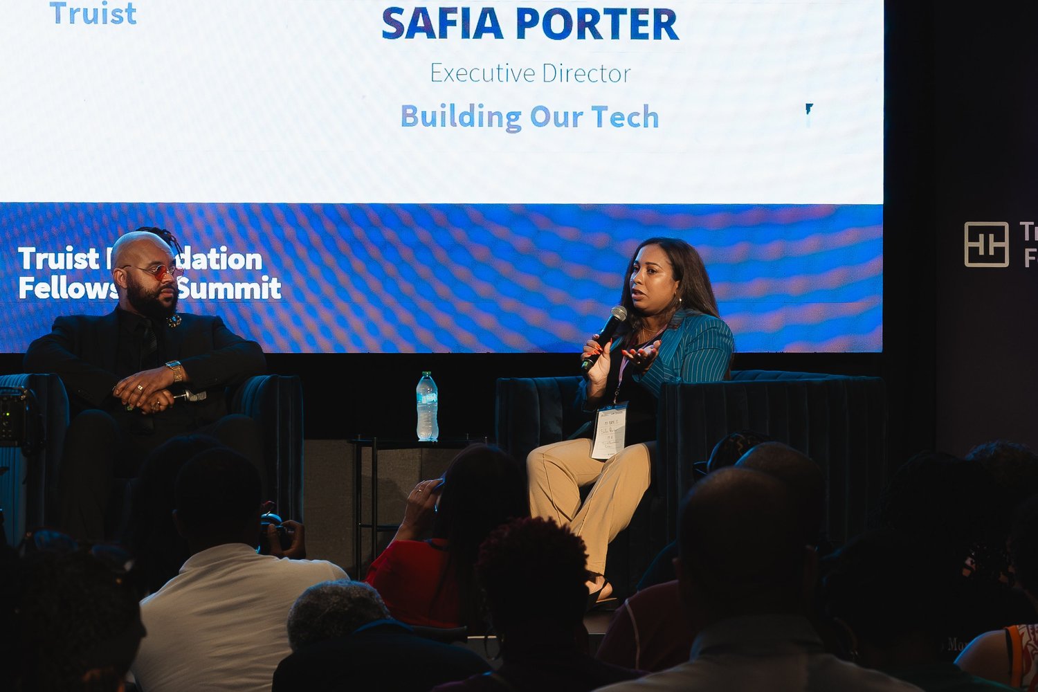 Safia Porter, Executive Director of Building Our Tech, speaking at a community event