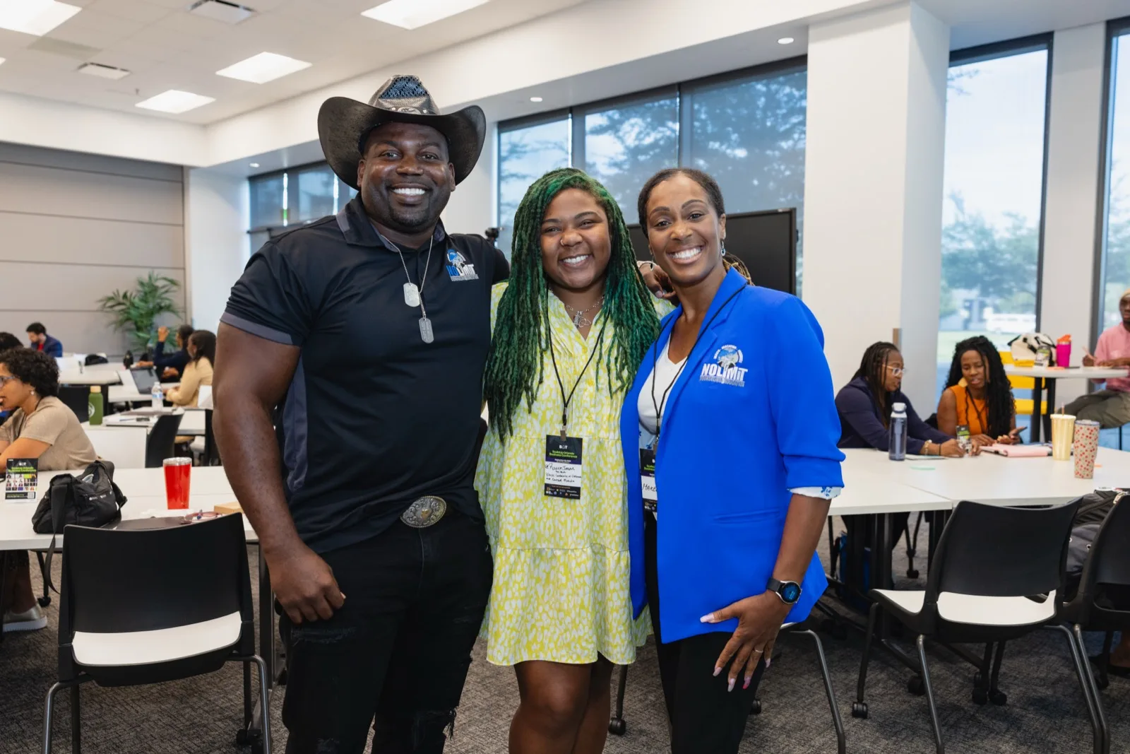 Three attendees talking together at the ScaleUp Orlando Business Conference