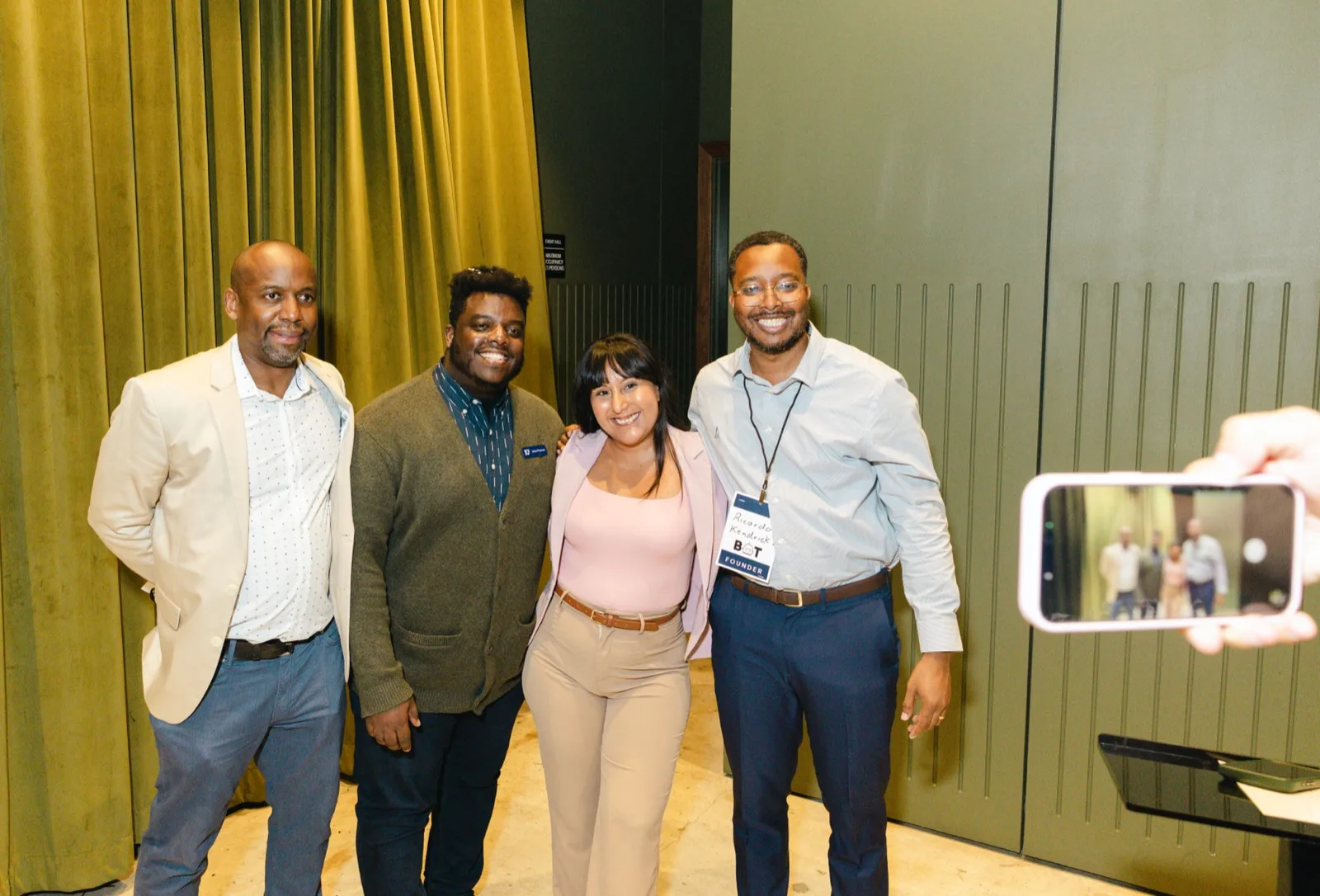 Spring 2026 founders Andrea Ortega and Ricardo Kendrick with program leads Joel Francois and Jehue Francois at a Building Our Tech showcase