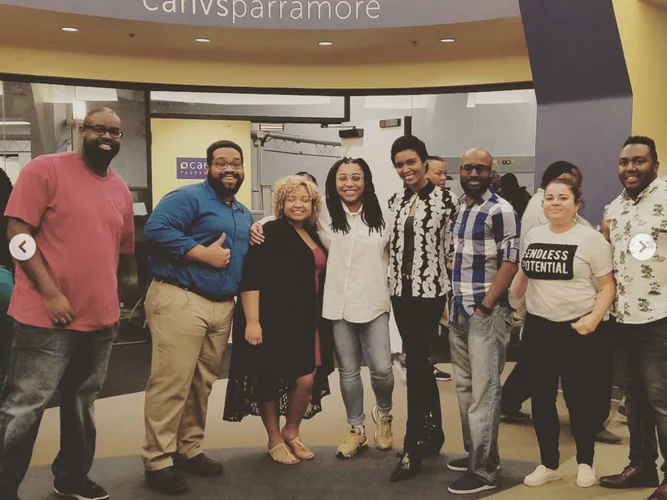 Panellists and guests standing together at Canvs Parramore after a panel of women of color working across the technical stack
